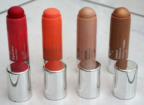 Left to Right: No 7 Pop and Glow Cream Blush Stick in Classic Rose, No 7 Pop and Glow Cream Blush Stick in Mango Sorbet, No 7 Instant Radiance Highlighter Stick, No 7 Instance Radiance Bronzing Highlighter Stick